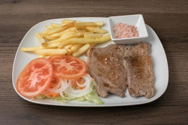 Churrasco de lomo bajo con chimichurri y patatas