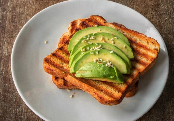 Tostada con aceite y tomate en Tizones